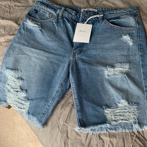 Distressed denim jeans